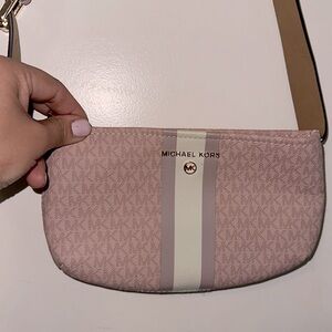 NWT Michael Kors belt bag in blush/pink/white. Belt is L/XL. Tiny snag pictured